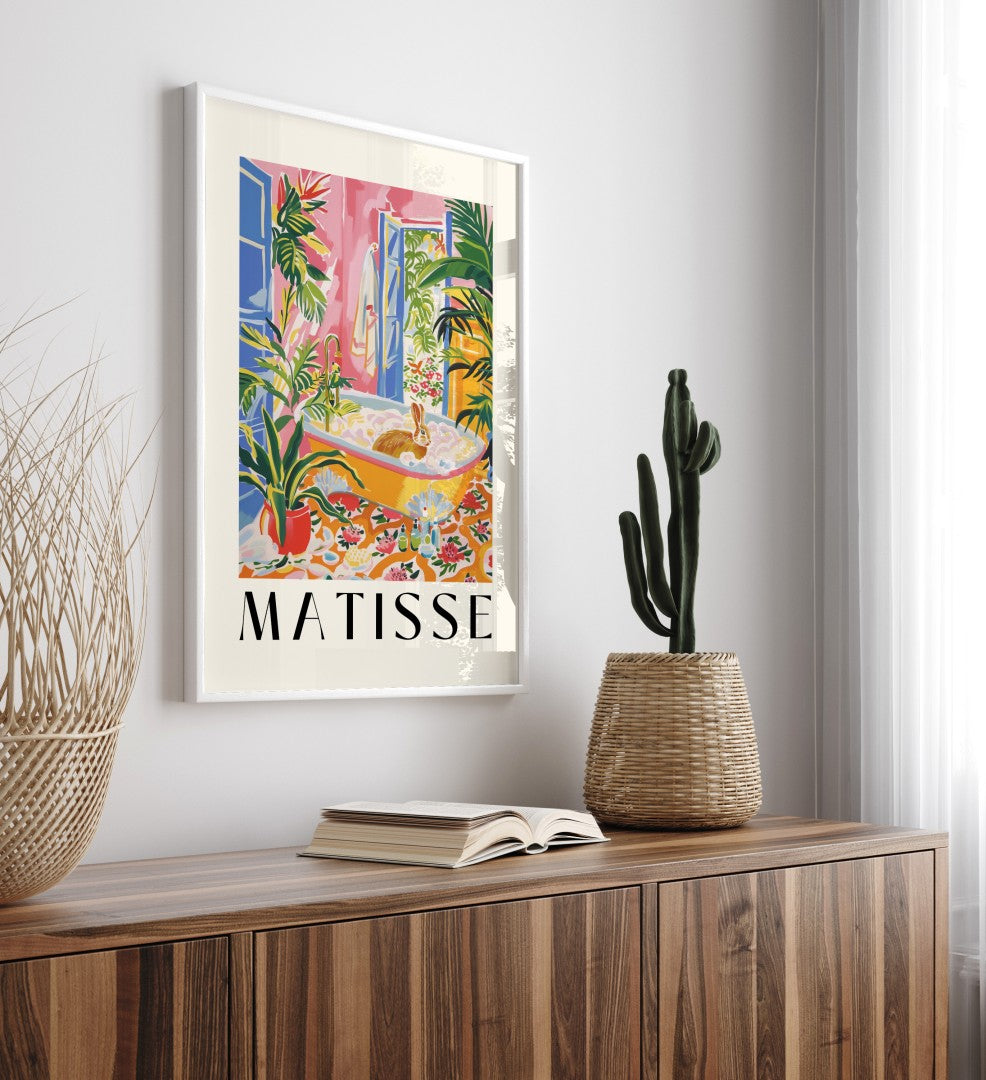 Framed tropical bathroom artwork inspired by Matisse, with a rabbit in a golden tub.