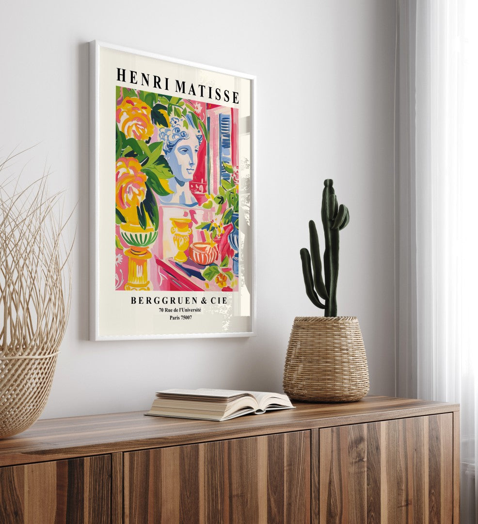 Classical bust with decorative vases in framed Matisse-inspired artwork.