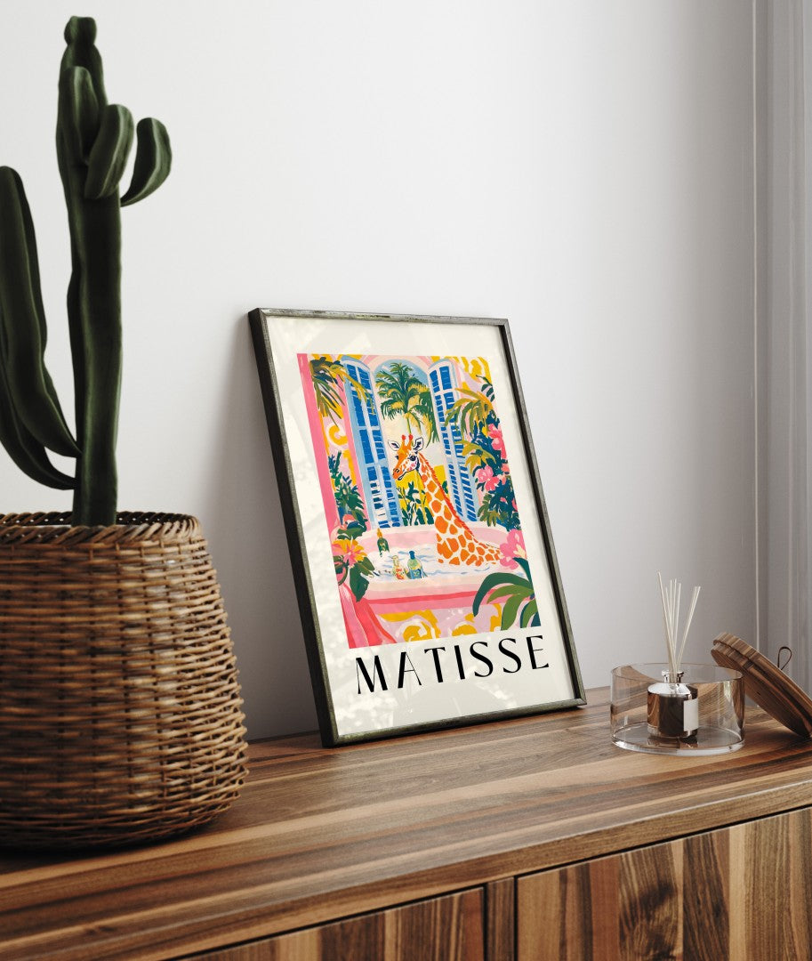 Framed bathroom wall art of a giraffe in a tub with vibrant flowers, Matisse style.