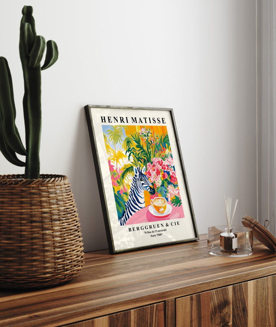 Framed art print showing zebra and latte in lush tropical landscape