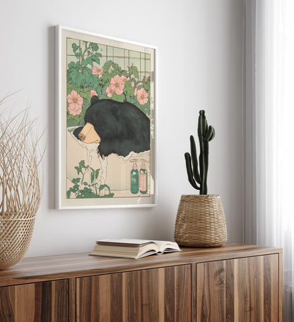 High-quality framed black bear bathroom print with gentle color and nature vibes