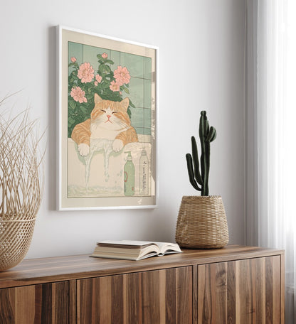 Framed cat-themed bathroom decor showing a tranquil tabby soaking in a Japanese-inspired bath
